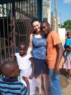Karen & Evenson in front of mission house