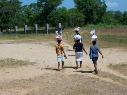 Carrying the rice home