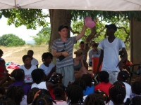Erik doing an object lesson for Bible Camp